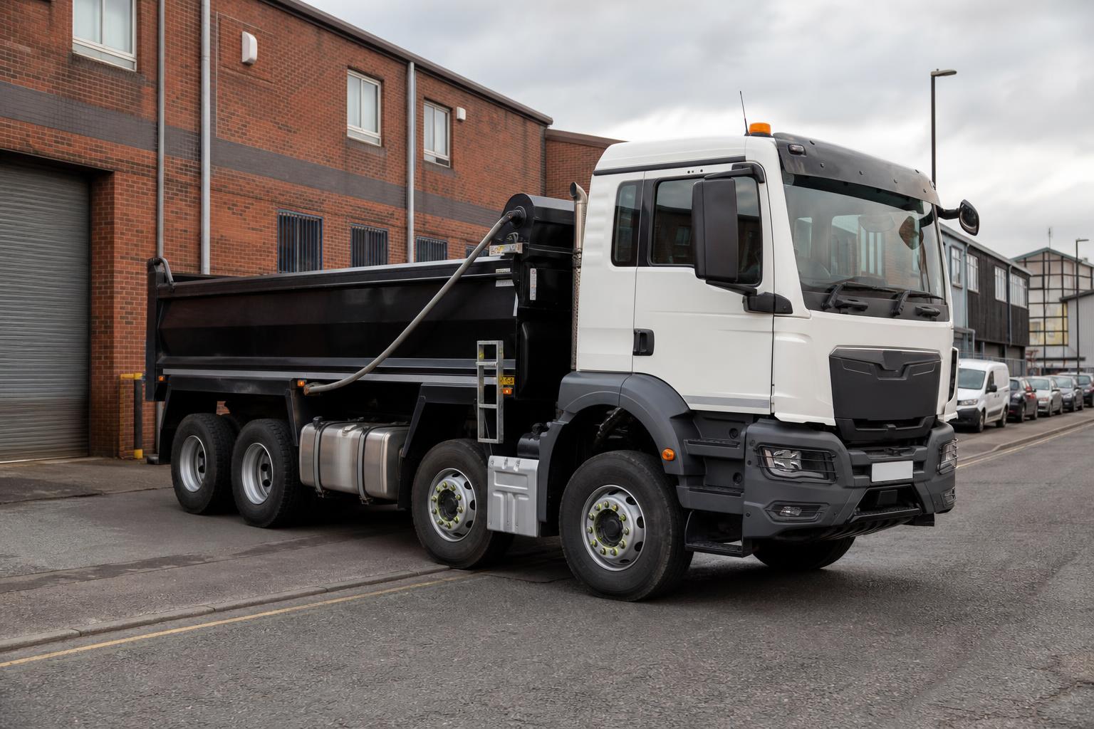 Modern tipper truck parked on an urban roadside in Dudley